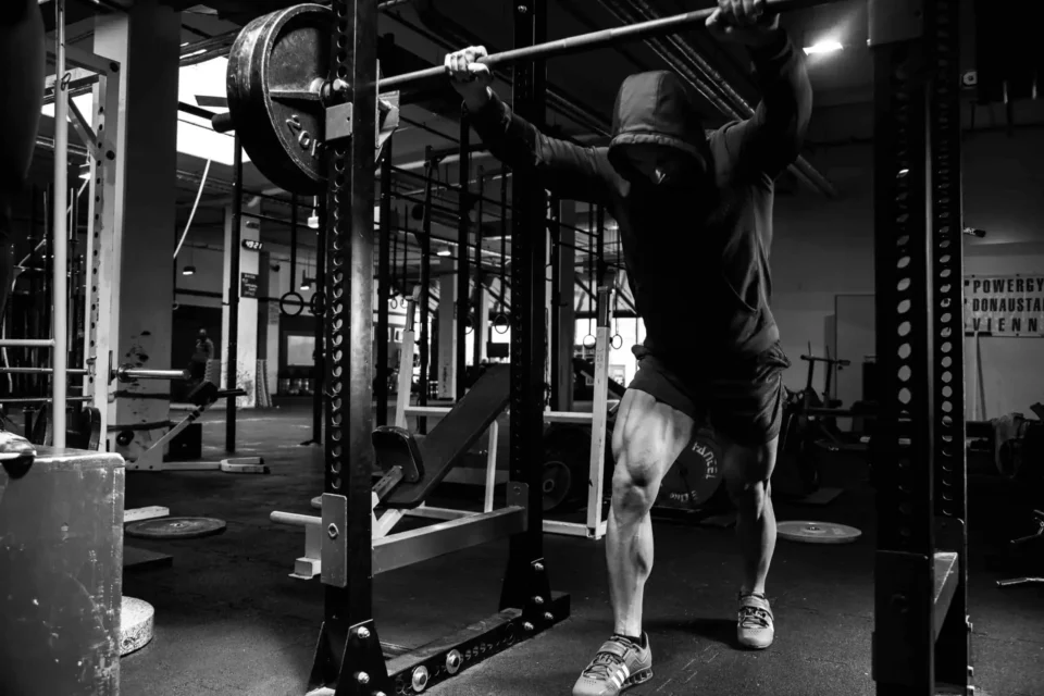 photo of person lifting weights